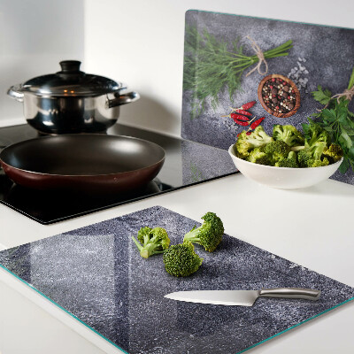 Deska kuchenna szklana Zioła i przyprawy na tle kamienia