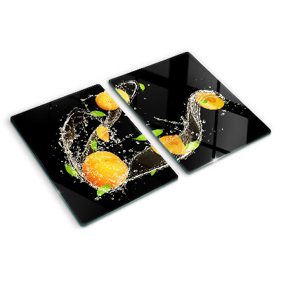 Snijplanken van glas Citrusvruchten in water