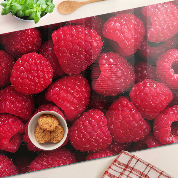 Glazen snijplanken Frambozen op de achtergrond