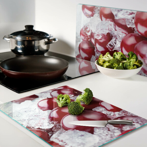 Snijplanken van glas Rode druiven op ijs