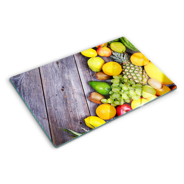 Snijplanken glas Fruit op een houten achtergrond