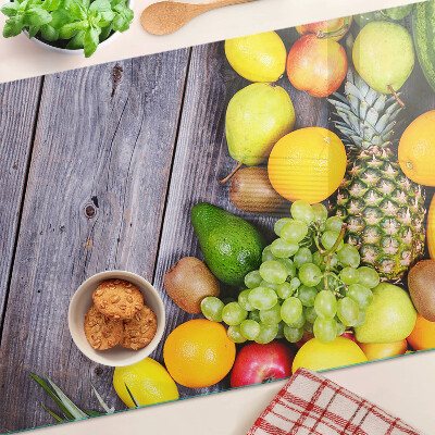 Snijplanken glas Fruit op een houten achtergrond