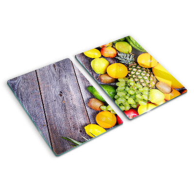 Snijplanken glas Fruit op een houten achtergrond