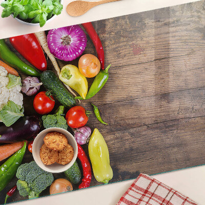 Szklana deska kuchenna Warzywa na drewnianym tle