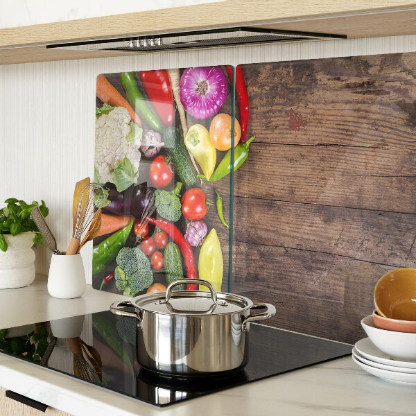 Szklana deska kuchenna Warzywa na drewnianym tle