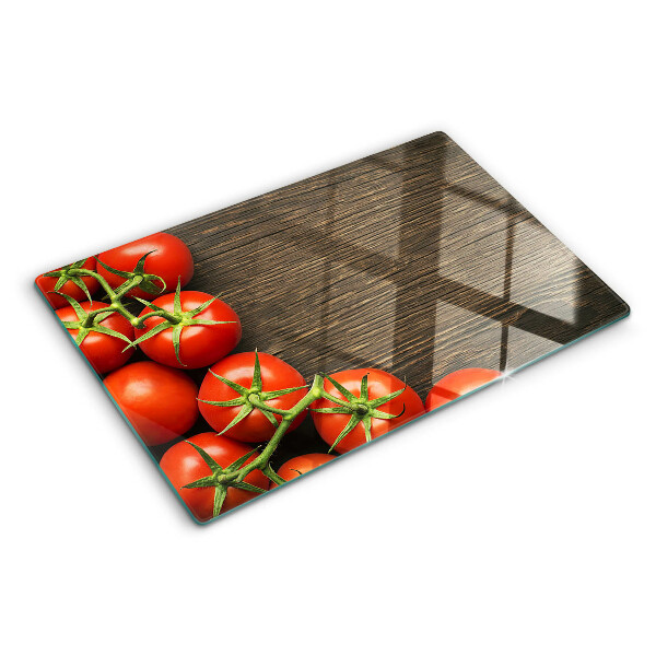Snijplanken glas Tomaten op een houten achtergrond