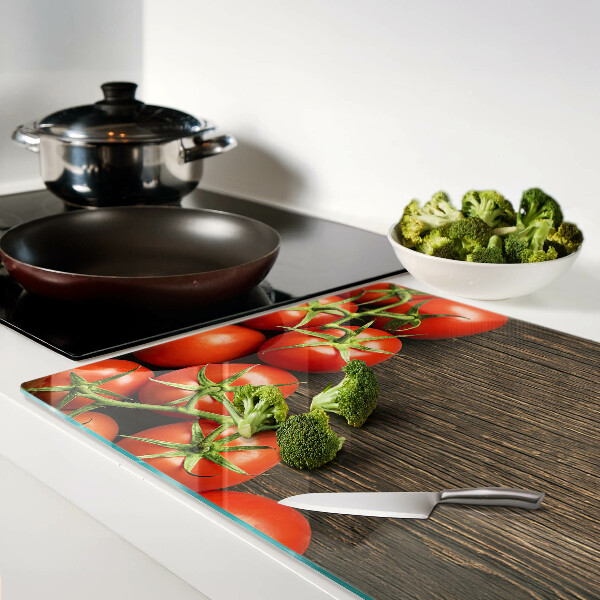 Snijplanken glas Tomaten op een houten achtergrond