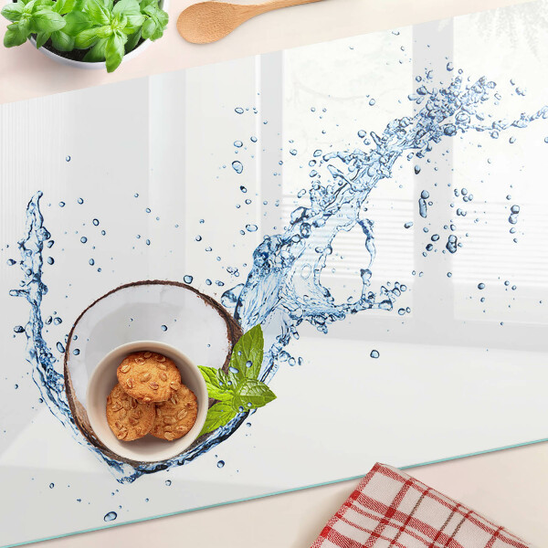 Snijplanken van glas Kokosnoot met water en munt