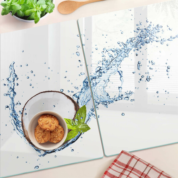 Snijplanken van glas Kokosnoot met water en munt
