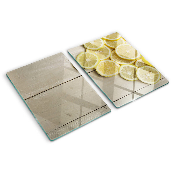 Snijplanken glas Citroenschijfjes op een houten achtergrond