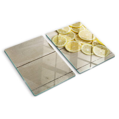 Snijplanken glas Citroenschijfjes op een houten achtergrond