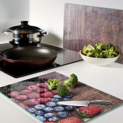 Szklana deska kuchenna Owoce leśne na drewnianym tle