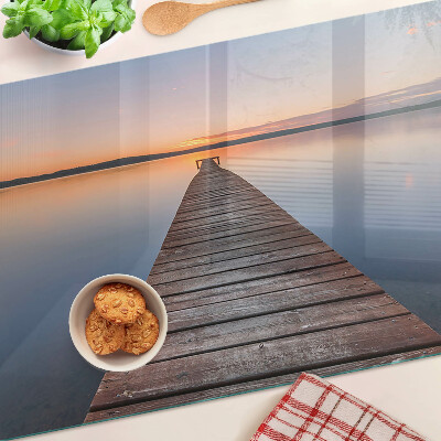 Szklana deska kuchenna Molo nad jeziorem o zachodzie słońca