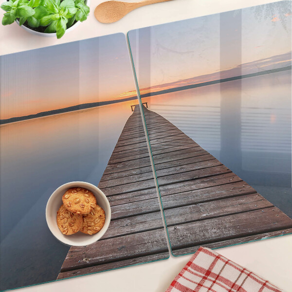 Szklana deska kuchenna Molo nad jeziorem o zachodzie słońca