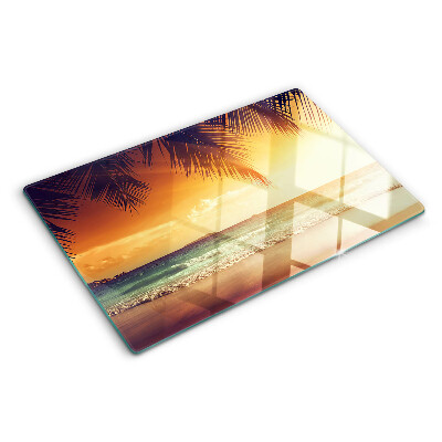 Snijplanken van glas Zonsondergang boven het strand