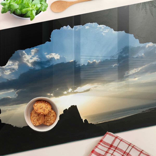 Snijplanken van glas Zonsondergang achter de wolken