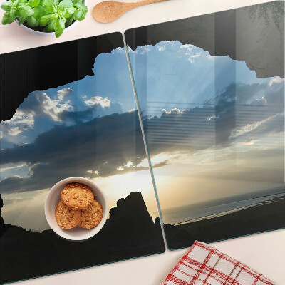 Snijplanken van glas Zonsondergang achter de wolken