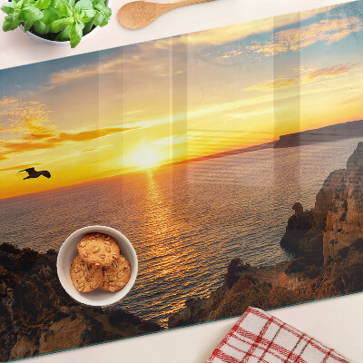 Snijplanken van glas Zonsondergang boven de zee