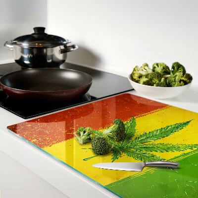 Szklana deska kuchenna Liść konopi na kolorowym tle