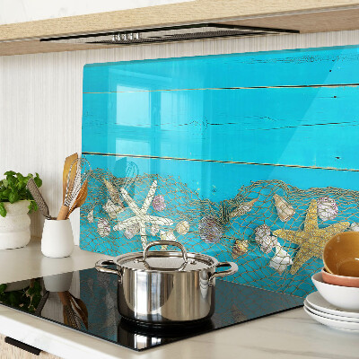 Szklana deska kuchenna Muszle i gwiazdy morskie w siatce