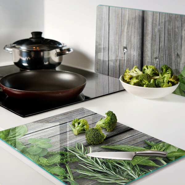 Szklana deska kuchenna Zielone zioła na drewnianym tle