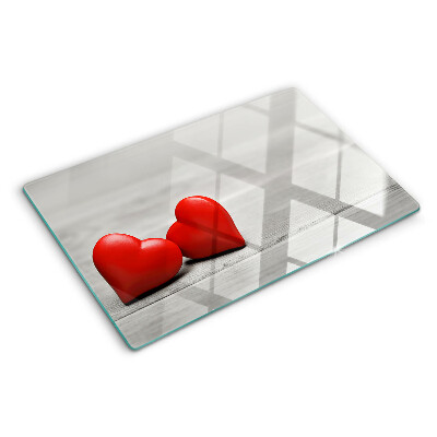 Szklana deska kuchenna Czerwone serca na tle drewnianym