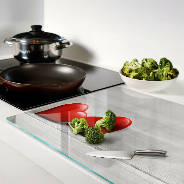 Szklana deska kuchenna Czerwone serca na tle drewnianym