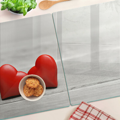 Szklana deska kuchenna Czerwone serca na tle drewnianym