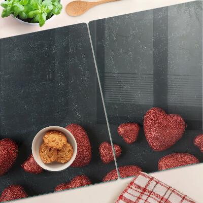 Deska kuchenna szklana Czerwone serca na ciemnym tle