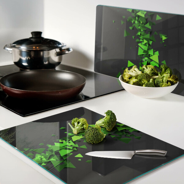 Szklana deska kuchenna Zielone trójkąty na czarnym tle