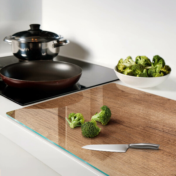 Snijplanken van glas Hout met weerspiegeling in het raam