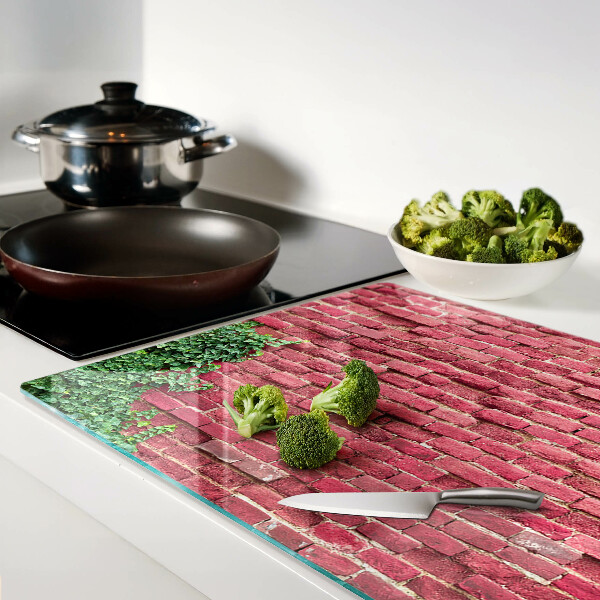 Deska kuchenna szklana Ceglana ściana z roślinnością