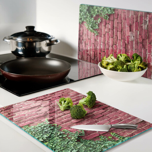 Deska kuchenna szklana Ceglana ściana z roślinnością