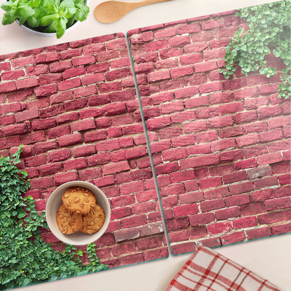 Deska kuchenna szklana Ceglana ściana z roślinnością