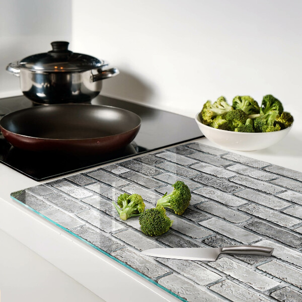 Snijplanken glas Bakstenen muur in grijstinten