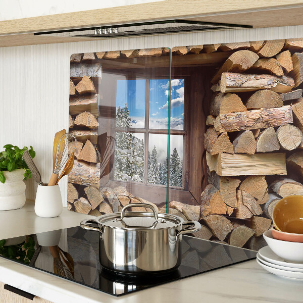 Szklana deska do krojenia Widok zimowego krajobrazu przez okno