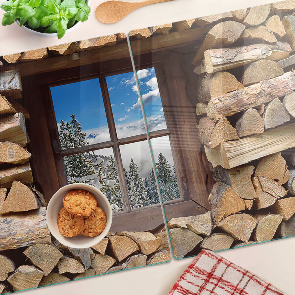 Szklana deska do krojenia Widok zimowego krajobrazu przez okno