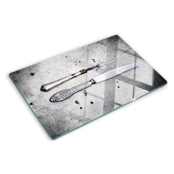 Szklana deska kuchenna Sztućce na tle betonu