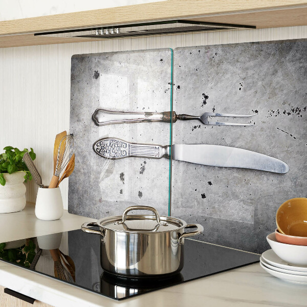 Szklana deska kuchenna Sztućce na tle betonu