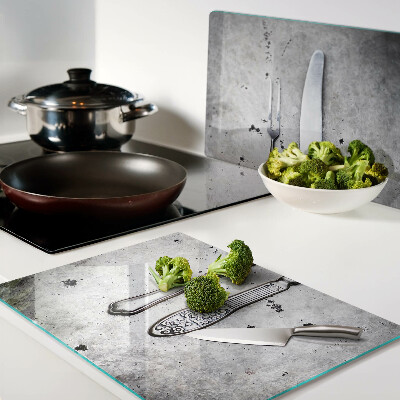 Szklana deska kuchenna Sztućce na tle betonu