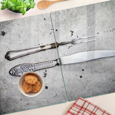 Szklana deska kuchenna Sztućce na tle betonu