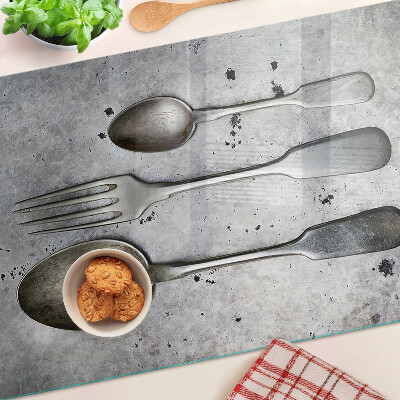 Deska kuchenna szklana Sztućce na tle betonu