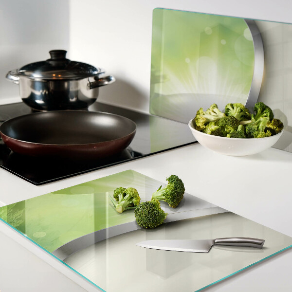 Snijplanken van glas Groene bokeh met lichtstralen