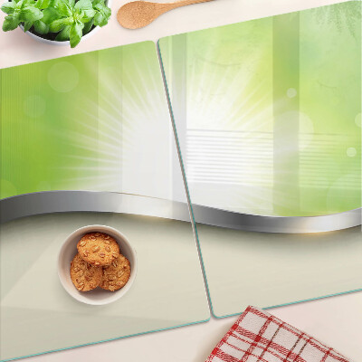 Snijplanken van glas Groene bokeh met lichtstralen