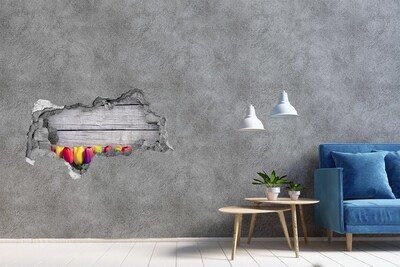 Samoprzylepna naklejka Kwiaty przez dziurę w ścianie