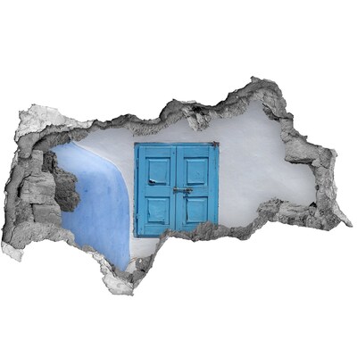 3D muursticker gescheurde muur Een kapotte muur met een blauwe deur.