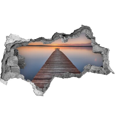 3D sticker gat in stenen muur Zonsondergang boven het meer