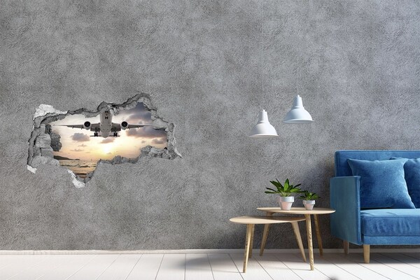 Foto zdjęcie dziura na ścianę Lot w zachodzącym słońcu