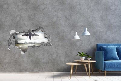 Foto zdjęcie dziura na ścianę Lądowanie samolotu w mieście