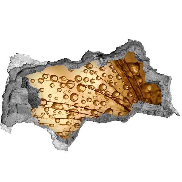 3D muursticker gescheurde muur Een gouden druppel op een betonnen achtergrond